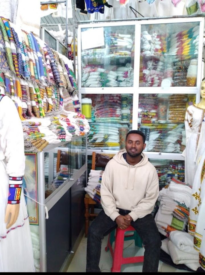 Roba Traditional Clothing artisan crafting an outfit